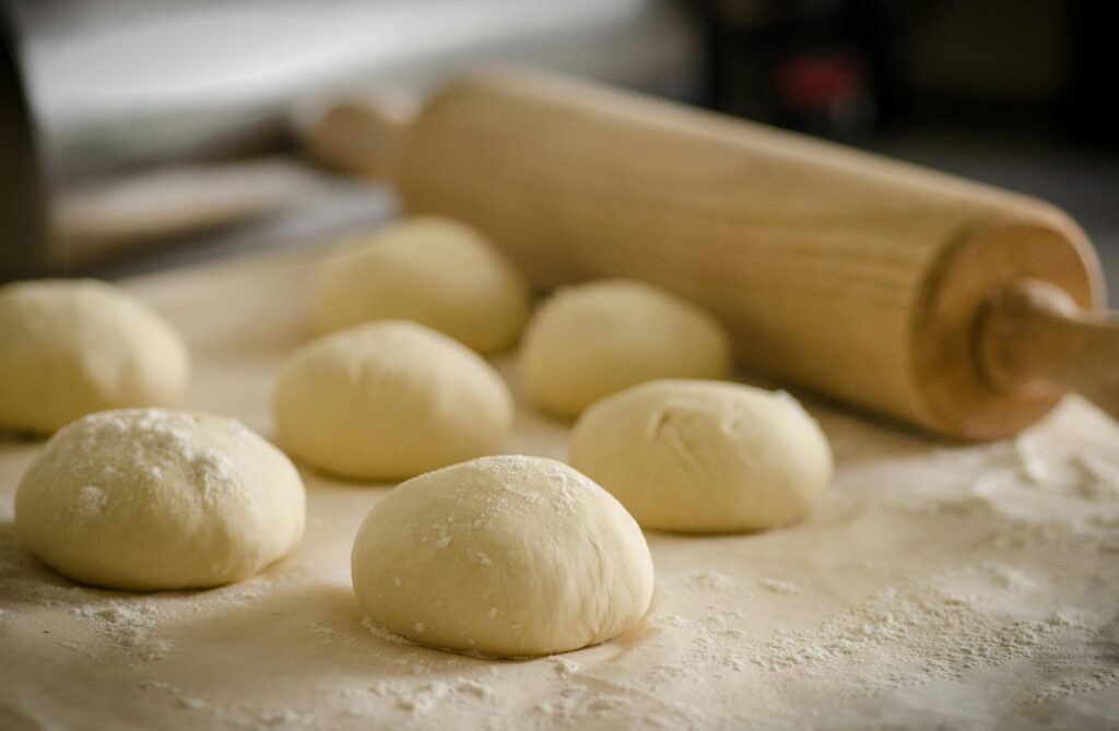 Rolls of dough rising on the counter